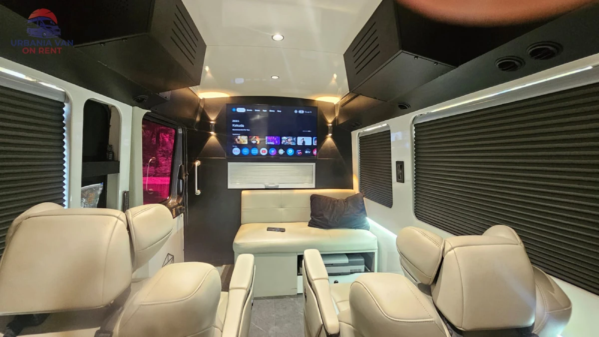 Urbania Van Luxury Lounge with Entertainment System Premium Urbania van lounge area with smart TV, luxury seating, ambient lighting and executive travel comfort